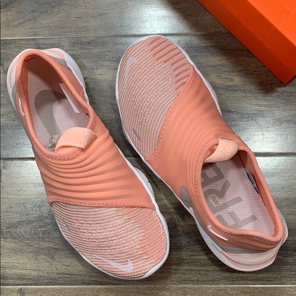 pink nike free rn